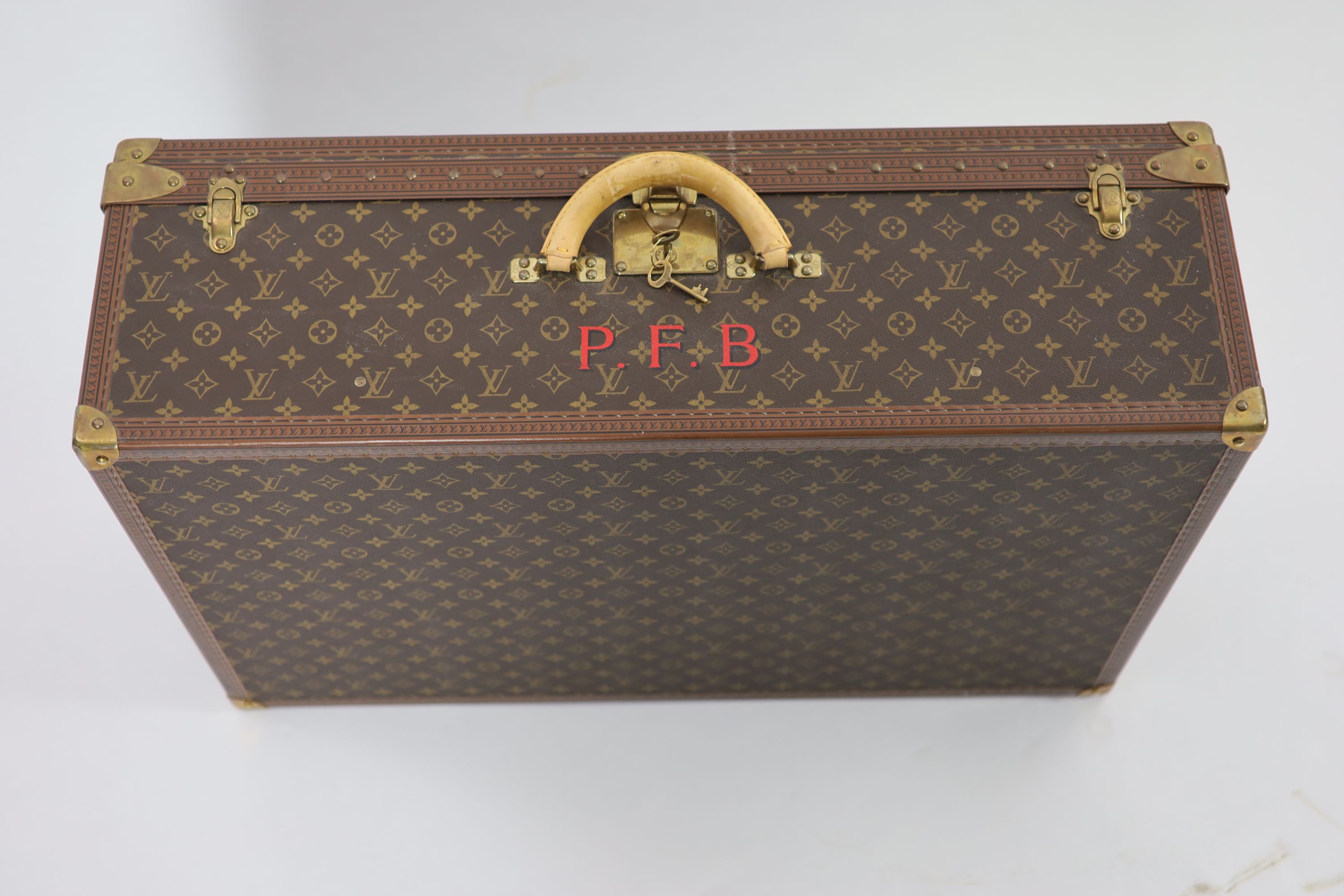 A modern Louis Vuitton Alzer 80 suitcase trunk, 80.5cm wide